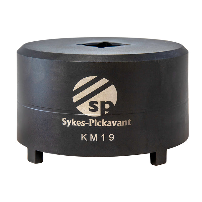 A black metal socket tool with the Sykes-Pickavant KM19 model label on it.